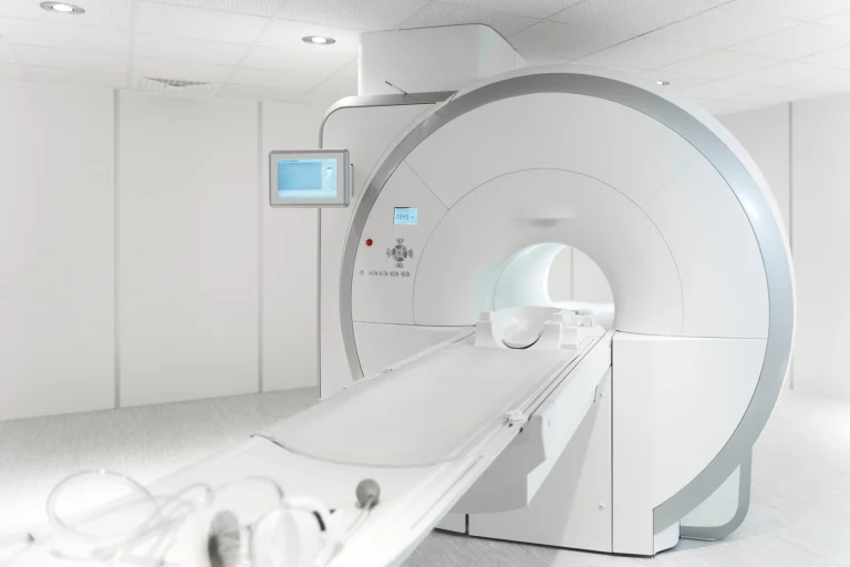CT scanner in a bright imaging room