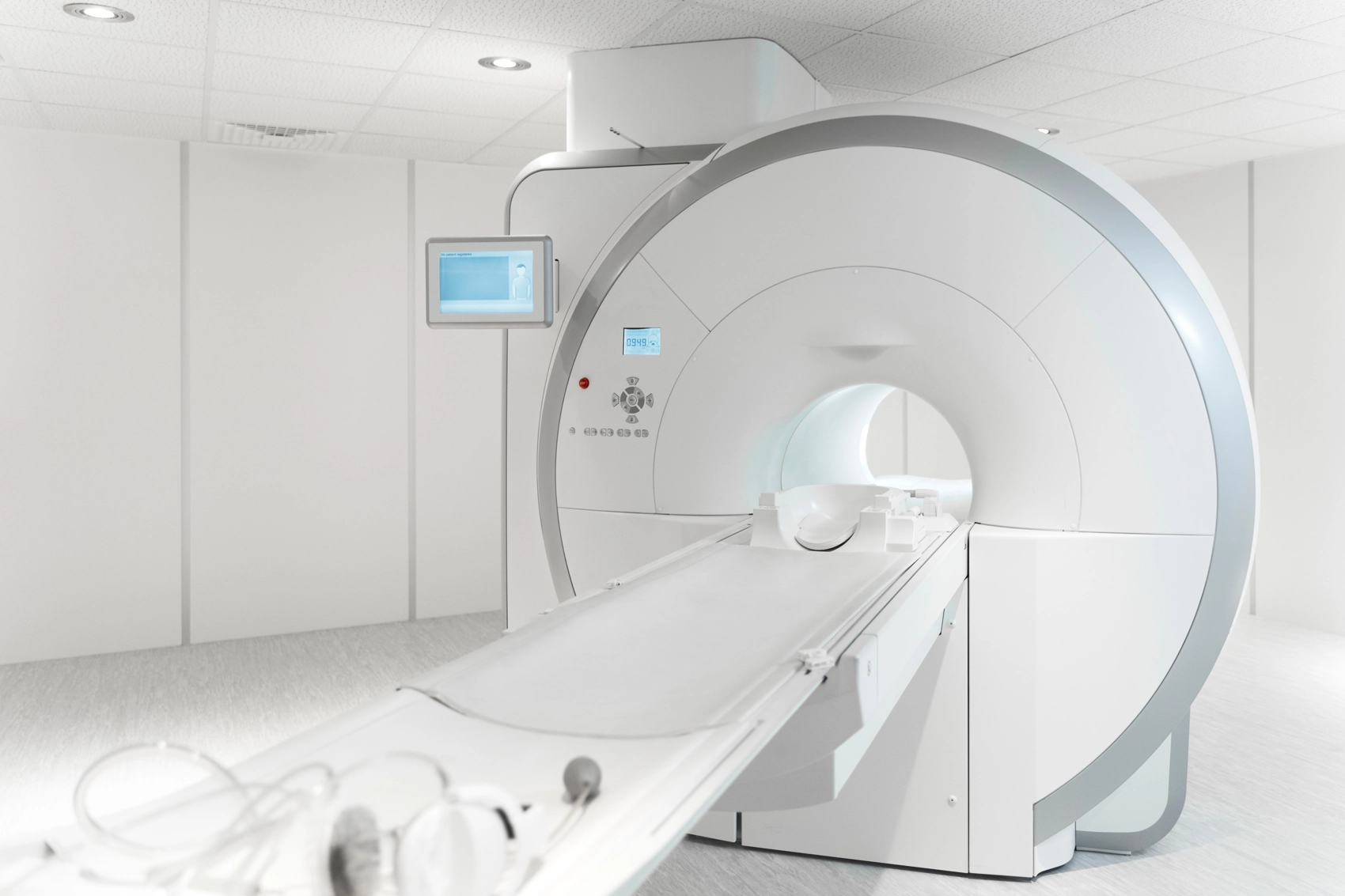 CT scanner in a bright imaging room