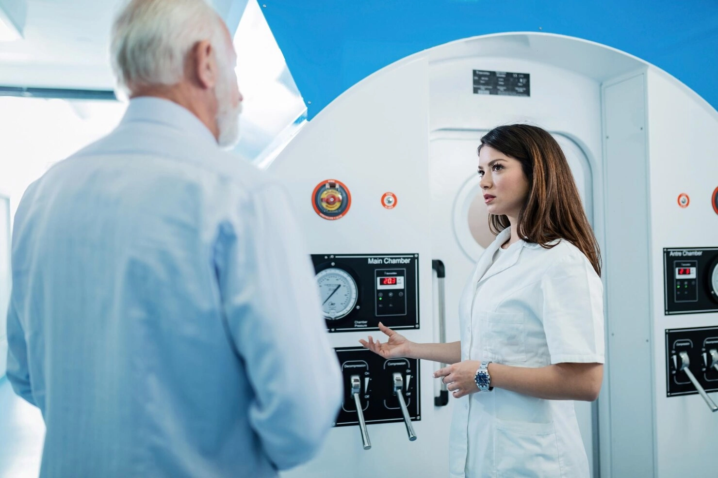 Medical team discussing imaging equipment