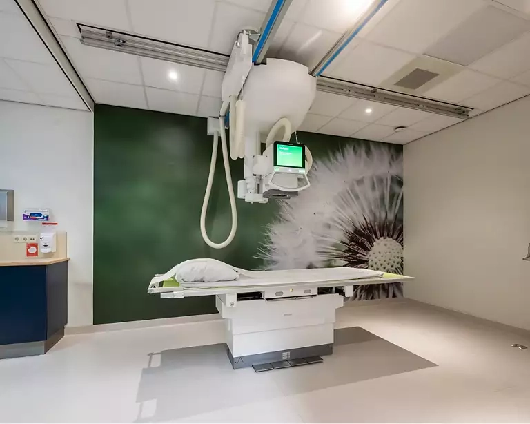 Hospital imaging room with C-arm equipment